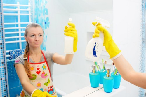 Trained technician using PPE during carpet cleaning