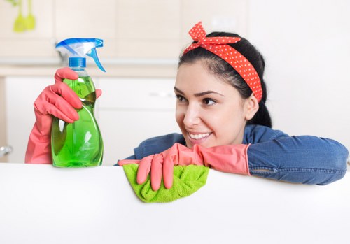 Staff member reviewing safety procedures during carpet cleaning work